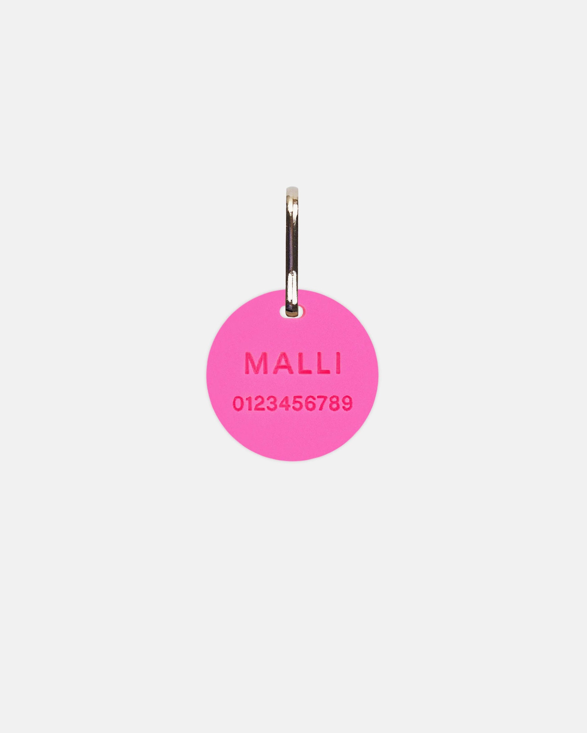 Kaiverrettu nimilaatta, pyöreä