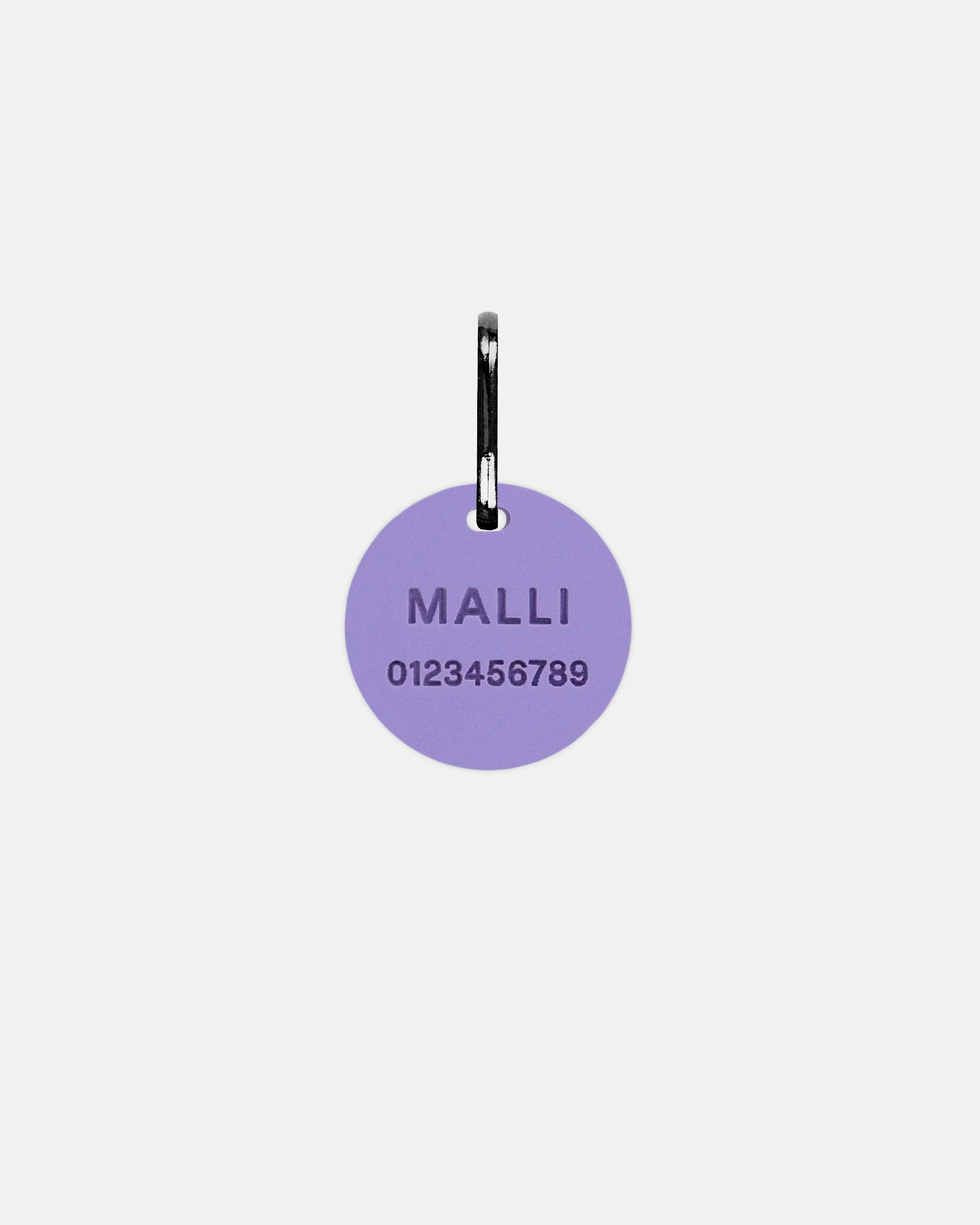 Kaiverrettu nimilaatta, pyöreä