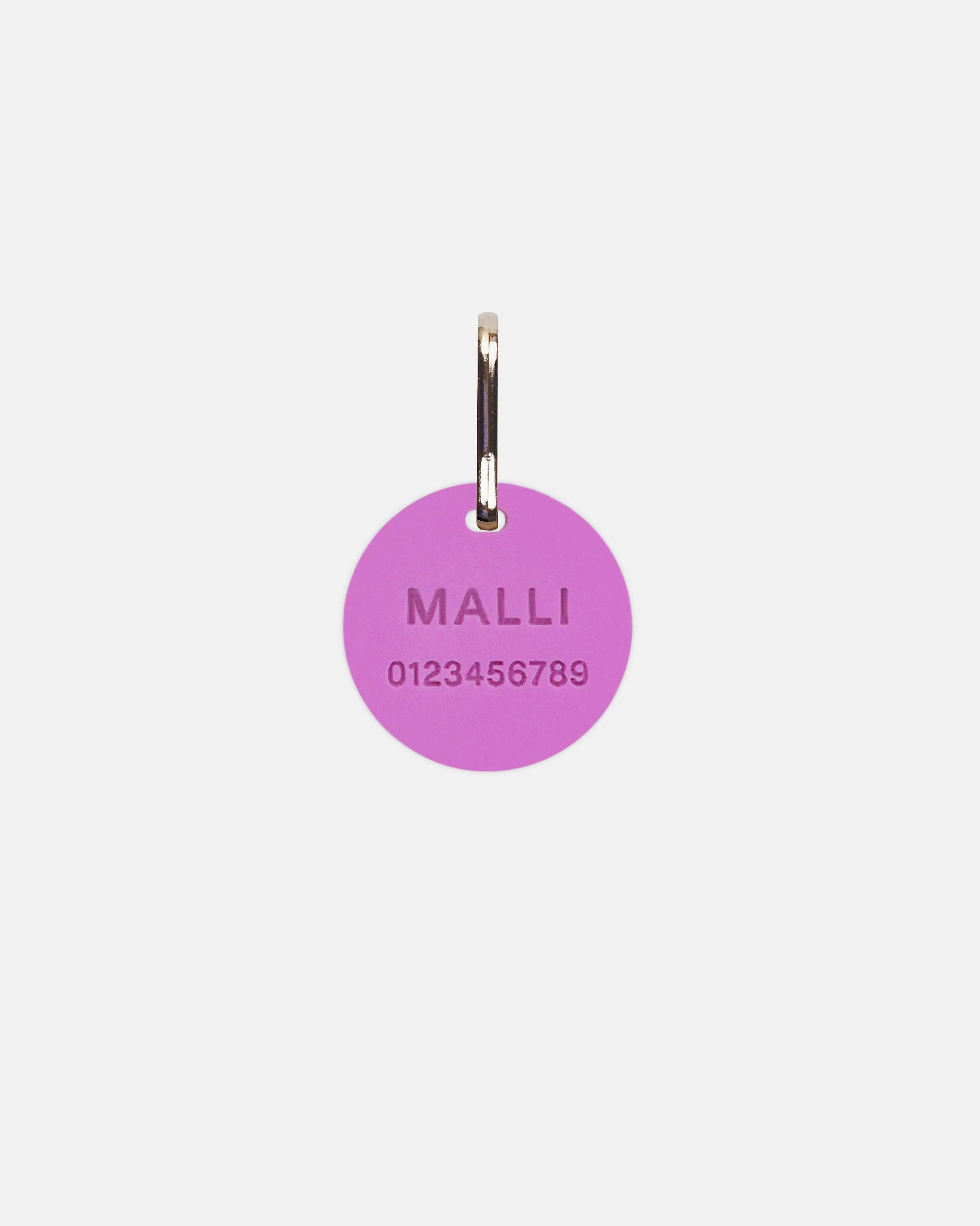 Kaiverrettu nimilaatta, pyöreä